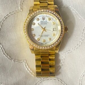 Princess Rolex Gold and White Mother-of-Pearl Dial Watch with Crystal Bezel
